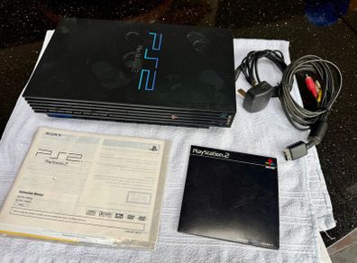 PS2 with instructions & cables , No controllers