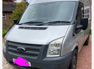 Silver 2012 Transit for breaking