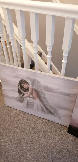 Beautiful angel canvases. Diammante edge around canvas  lovely on a wall