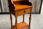 A pine gallery back side table/ wash stand with drawer.