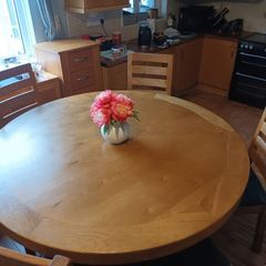 Large round oak table with 4 chairs