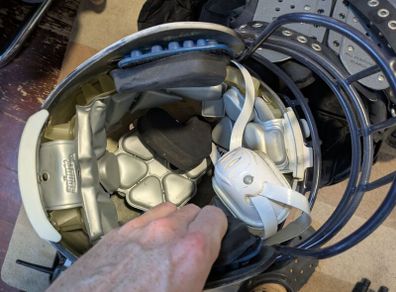 American football helmet and pads