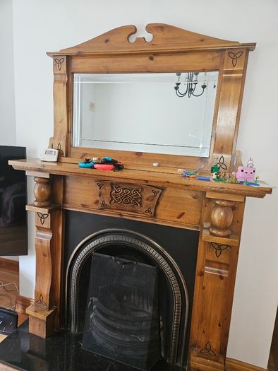 Fireplace mantle with mirror