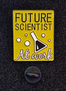 Future scientist at work, pin back badge.