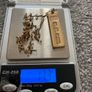 gold chain and bar Image 5