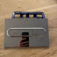 Roca chrome flush plate