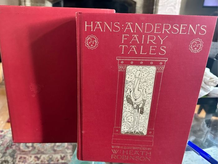 Delve into the enchanting world of Hans Christian Andersen with "Hans Anderson's Fairy Tales" presented by The Folio Society in 2001. This hardcover edition, graced with the whimsical illustrations of W. Heath Robinson, offers a timeless collection that t