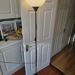 Floor lamp with energy saving bulb