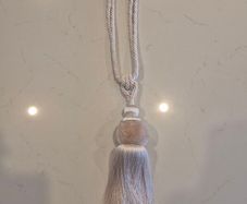 Curtain tie back.