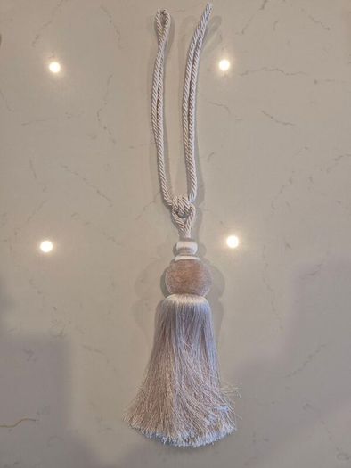 Curtain tie back.