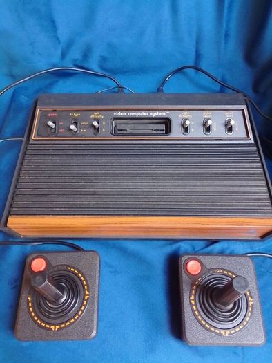 Atari 2600 'woody' console set with ganes