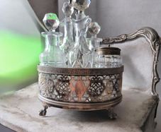 Antique Victorian Silver Plated Cruet Set 5 Crystal Bottles and Antique Silver Plated Table Centrepiece Stand by James Dixon and Sons Sheffield