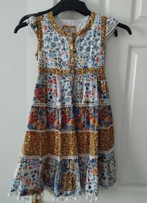 Dress with pom poms age 6- 7