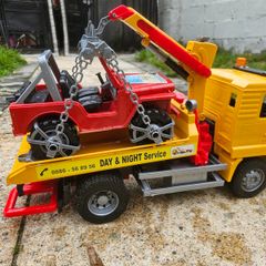 Bruder MAN TGA Tow Truck with All-Terrain Jeep