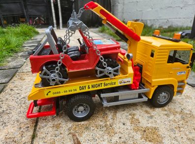 Bruder MAN TGA Tow Truck with All-Terrain Jeep