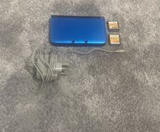 Nintendo 3ds XL Includes (charger and 2 games)