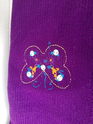 new child's scarf tag attached