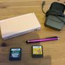 Pink Nintendo DS lite with charger and games Image 3