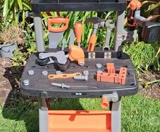 Kids Black & Decker toy tool bench .