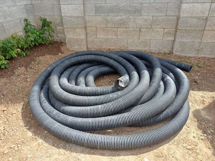 Water drainage pipe for back garden or Land