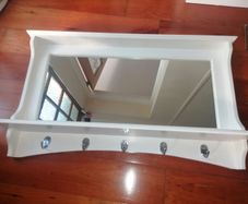 Beautiful wooden framed hall mirror, with coat & hat hooks.