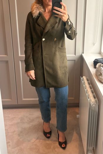 olive green faux-suede double-breasted coat featuring a prominent plush F U R colla