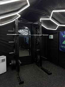 Full commercial Squat rack and 150kg of plates