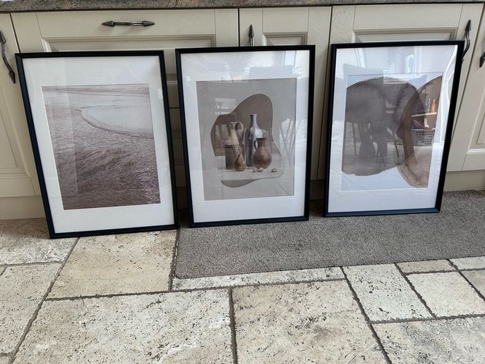 large black frames and prints x3