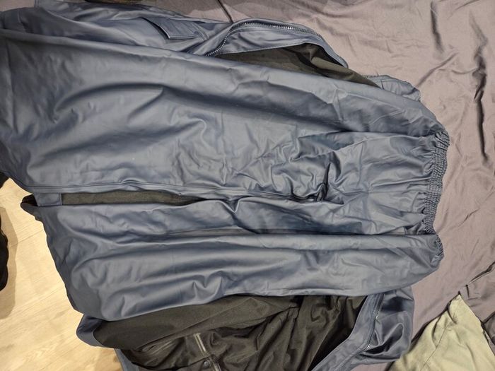 Waterproof jacket and trouser over alls