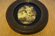 Vintage wall hanging depicting a scene of a guardian angel watching over 2 children