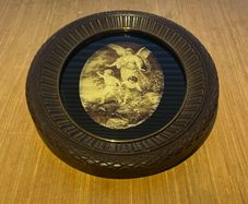 Vintage wall hanging depicting a scene of a guardian angel watching over 2 children