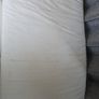 Twin bed, quite high, to store things underneath Image 4