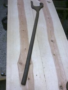 Old Irish blacksmith made wheelwright's tyre dog