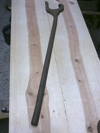 Old Irish blacksmith made wheelwright's tyre dog
