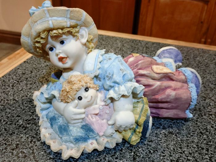 Lovely Figurine/ornament Of Child With Doll (used).