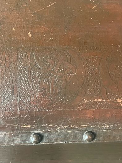 Rare antique low shoe changing bench. With celtic design embossed in the  leather