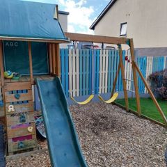 playhouse with swing and slide