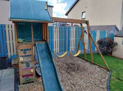 playhouse with swing and slide