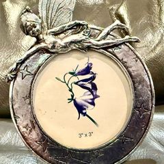 The Enameled Metal Fairy Round Photo Picture Frame.