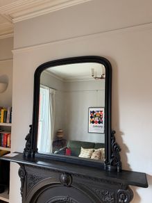 Black over mantle mirror
