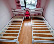2 single wooden bed frames