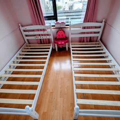 2 single wooden bed frames