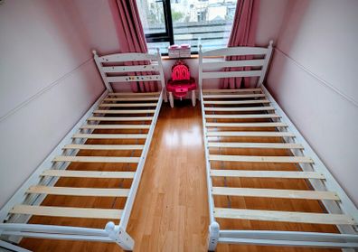 2 single wooden bed frames