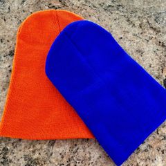 Pair of orange and blue hats
