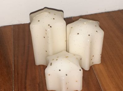 Brand New star shaped White/Christmas Pillar candles