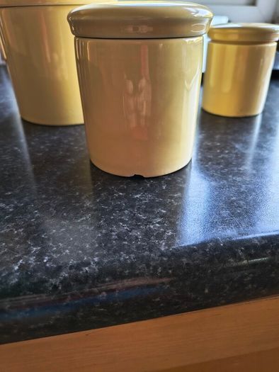 ceramic yellow storage jars