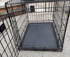 small dog crate with blackout cover