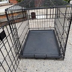 small dog crate with blackout cover