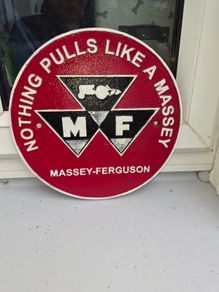 Nothing  pulles like massey cast iron sign
