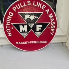 Nothing  pulles like massey cast iron sign